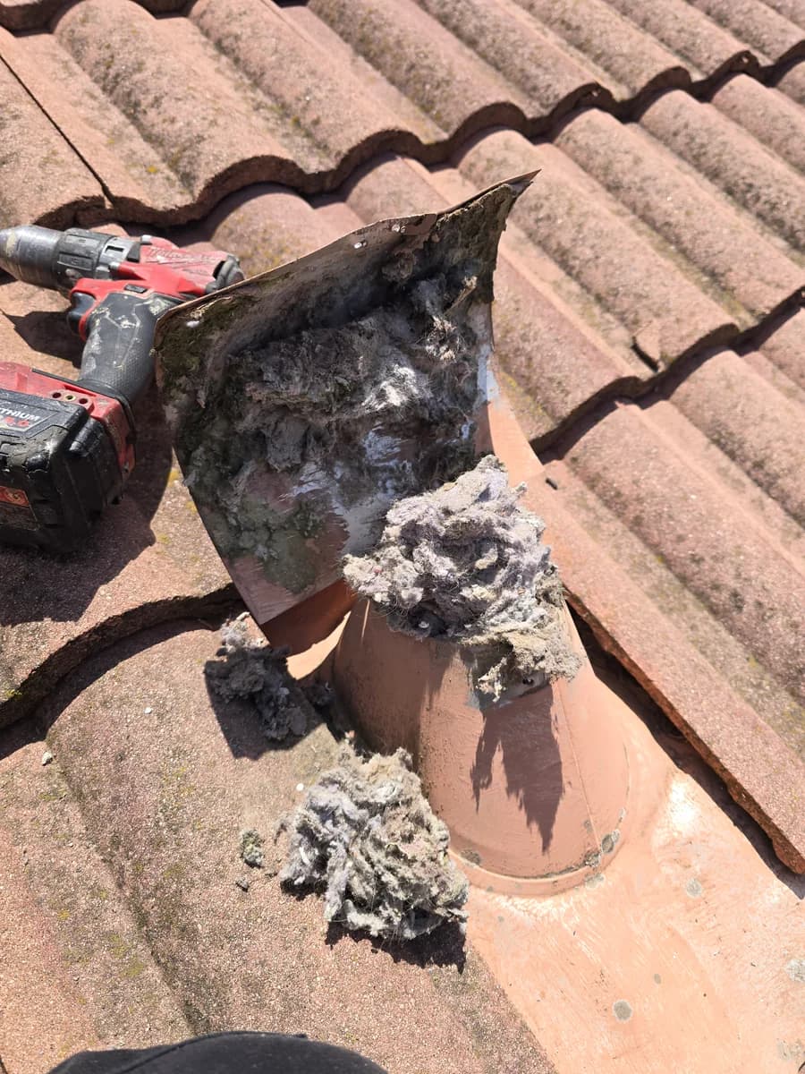 Clogged dryer vent exhaust restricting airflow